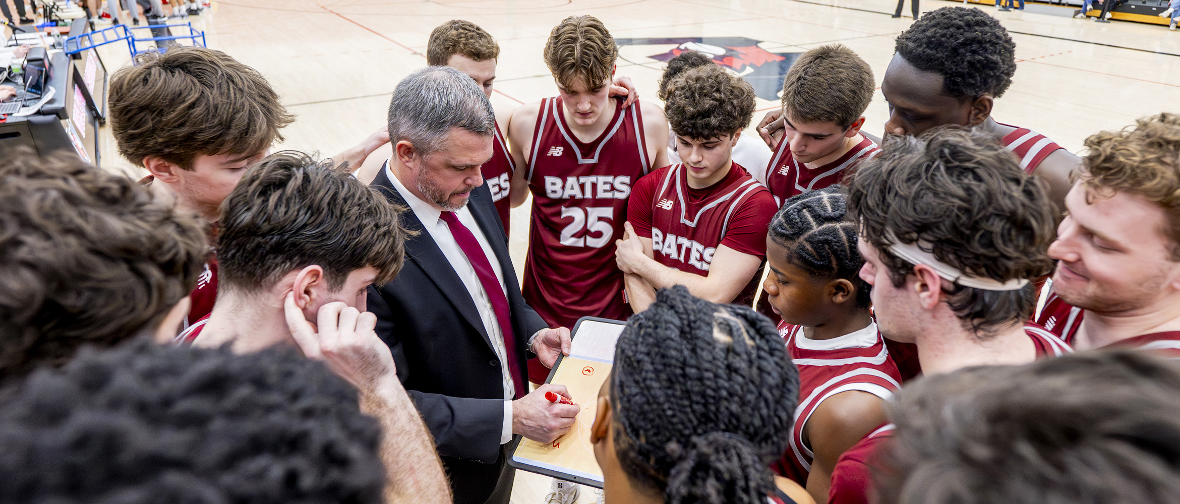 Coach drawing a play